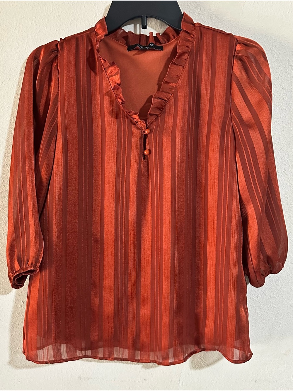Ava Rose Ruffled V‑Neck Stripe Blouse in Rust
